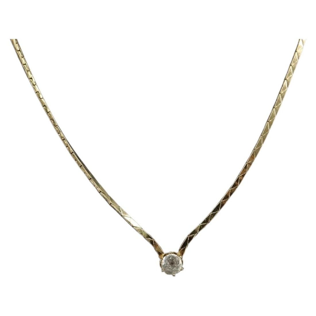 Gold Tone Metal Necklace by Christian Dior: Gold Tone Metal Necklace by Christian Dior This Christian Dior necklace features a gold tone metal construction and a total length of approximately 44 cm (17.3 inches). The piece displays slight surfa