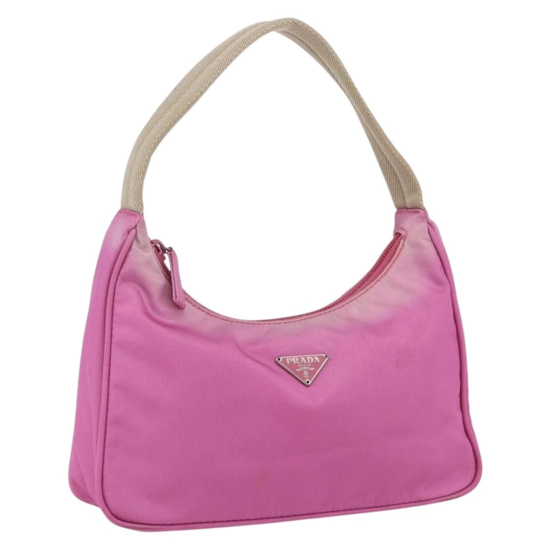 Pink Nylon Prada Hand Bag with Top Handle: Pink Nylon Prada Hand Bag with Top Handle This Prada hand pouch is crafted from pink nylon and made in Italy. The bag features a compact design with a top handle, making it suitable for carrying essen
