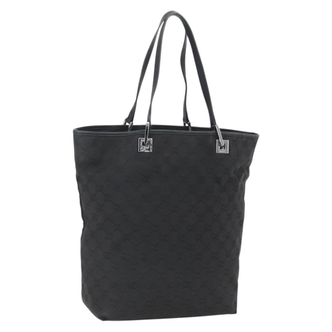 Black Silver GG Canvas Tote Bag Gucci 31243 Made in Italy: Black Silver GG Canvas Tote Bag Gucci 31243 Made in Italy This Gucci tote bag features the iconic GG canvas in black and silver tones. Crafted in Italy, it offers a classic design with a handle drop o