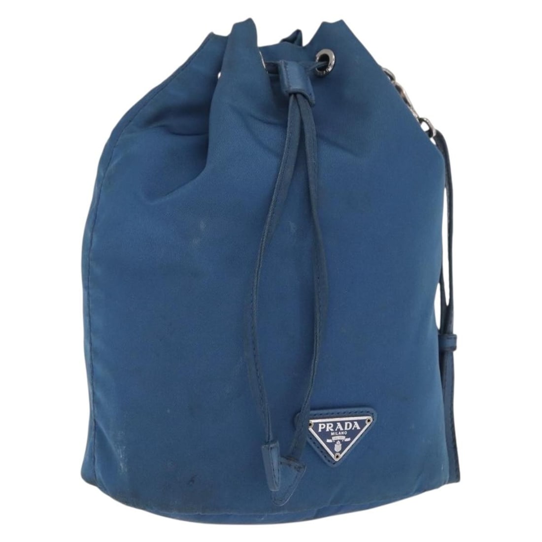 Light Blue Nylon Pouch by PRADA Silver Accents Made in Italy: Light Blue Nylon Pouch by PRADA Silver Accents Made in Italy This PRADA pouch is crafted from light blue nylon with silver-tone detailing. Made in Italy, it features a compact design suitable for carr