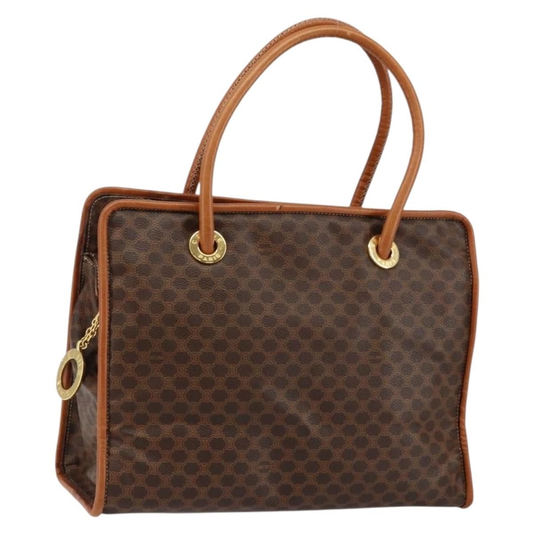 CELINE Macadam Canvas Hand Bag PVC Brown Gold Made in Italy: CELINE Macadam Canvas Hand Bag PVC Brown Gold Made in Italy This authentic CELINE Macadam Canvas Hand Bag showcases a sophisticated blend of brown PVC leather and gold accents, making it a stylish acc