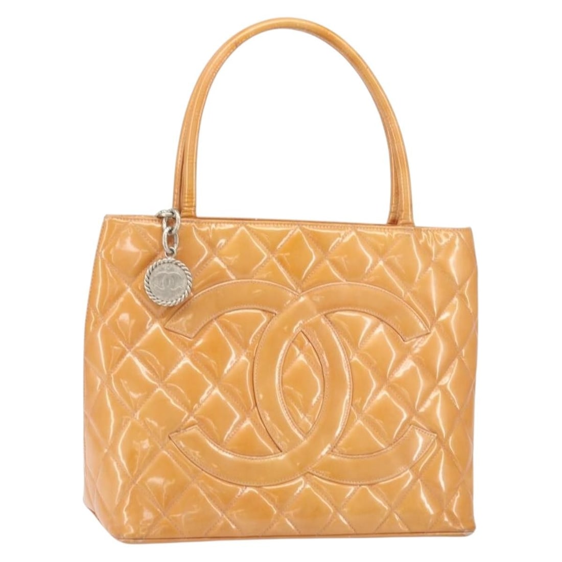 CHANEL Orange Patent Leather Matelasse Tote Bag Silver CC Reprint: CHANEL Orange Patent Leather Matelasse Tote Bag Silver CC Reprint This CHANEL Matelasse Reprint tote bag features patent leather in a vibrant orange and silver color combination. Crafted in France, it