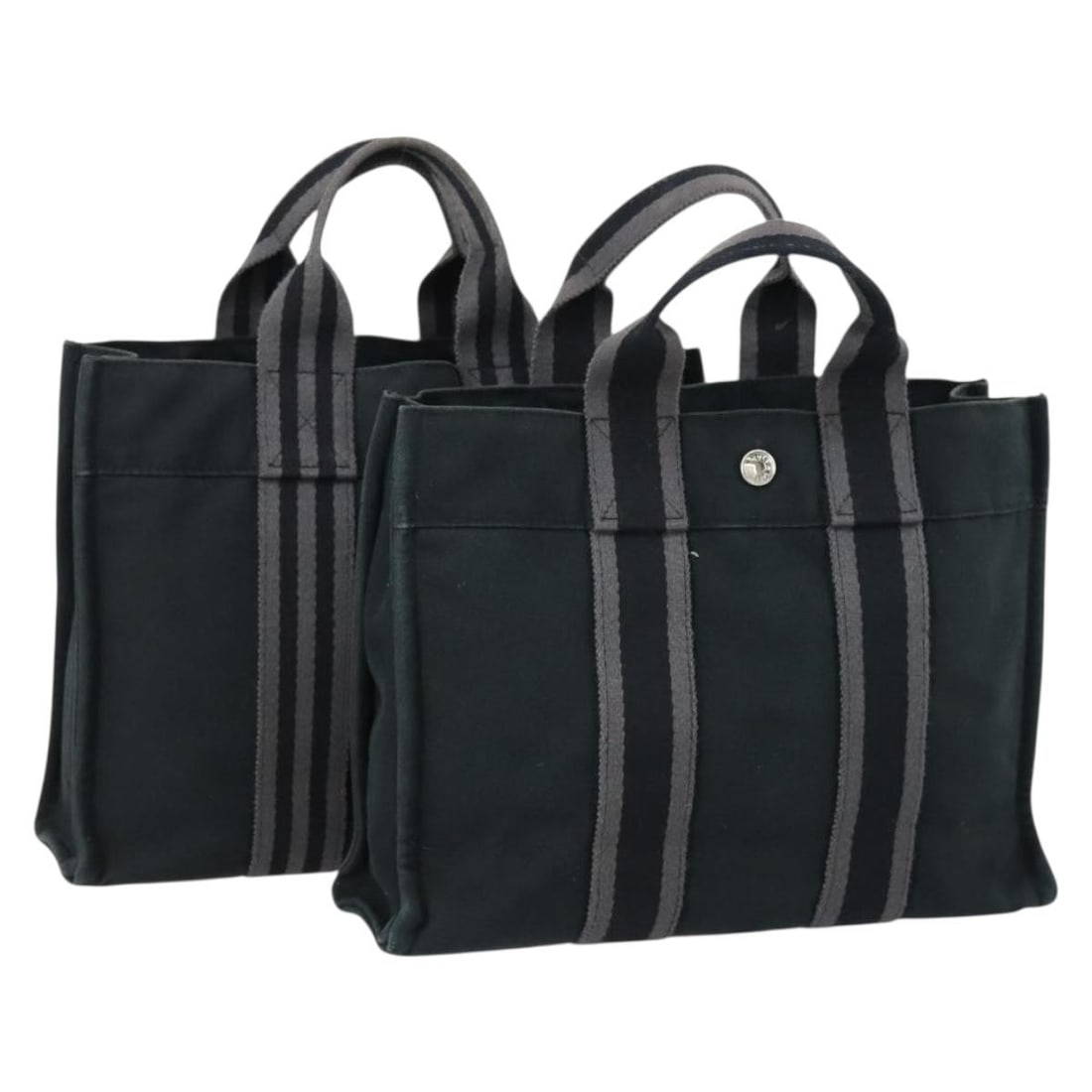 Set of 2 Hermes Fourre Tout PM Black Canvas Handbags from France: Set of 2 Hermes Fourre Tout PM Black Canvas Handbags from France This is an Hermes Fourre Tout PM handbag set crafted from black canvas. The bag features a classic hand-carry style and was made in Fra