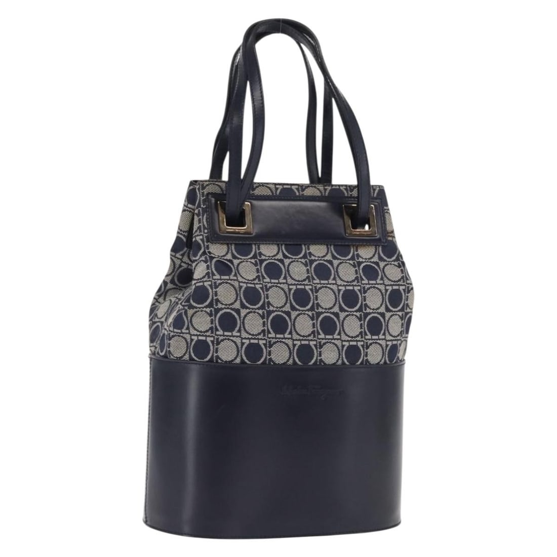 Navy Canvas Gancini Shoulder Purse by Salvatore Ferragamo Italy: Navy Canvas Gancini Shoulder Purse by Salvatore Ferragamo Italy This Salvatore Ferragamo Gancini shoulder bag features a navy and gold canvas exterior with a classic design. The bag is made in Italy a