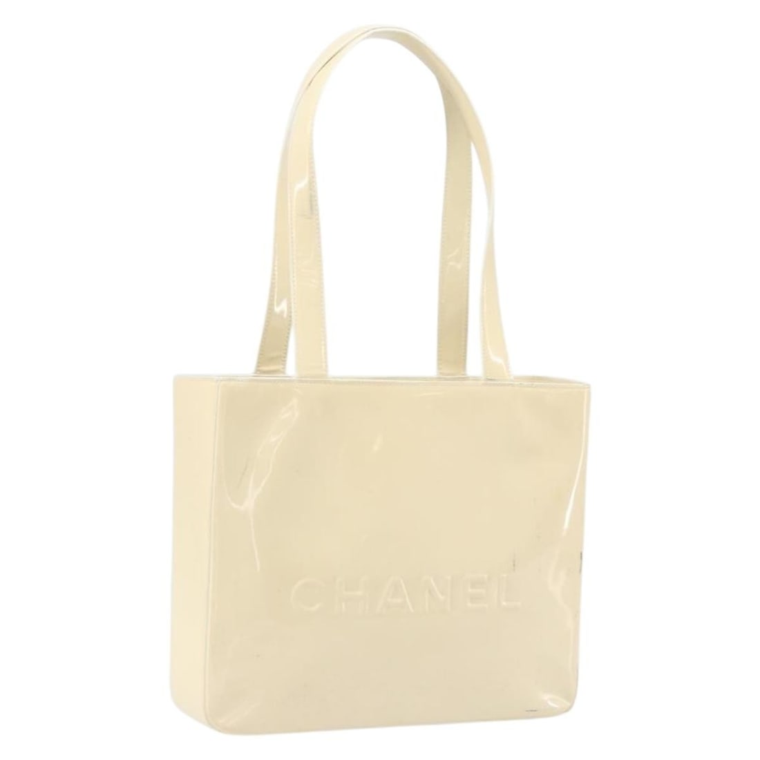 Chanel Beige Patent Leather Tote with Gold CC Emblem and Card: Chanel Beige Patent Leather Tote with Gold CC Emblem and Card This CHANEL tote bag features a beige and gold patent leather exterior with gold-tone CC detail. Made in France, this stylish tote is desi
