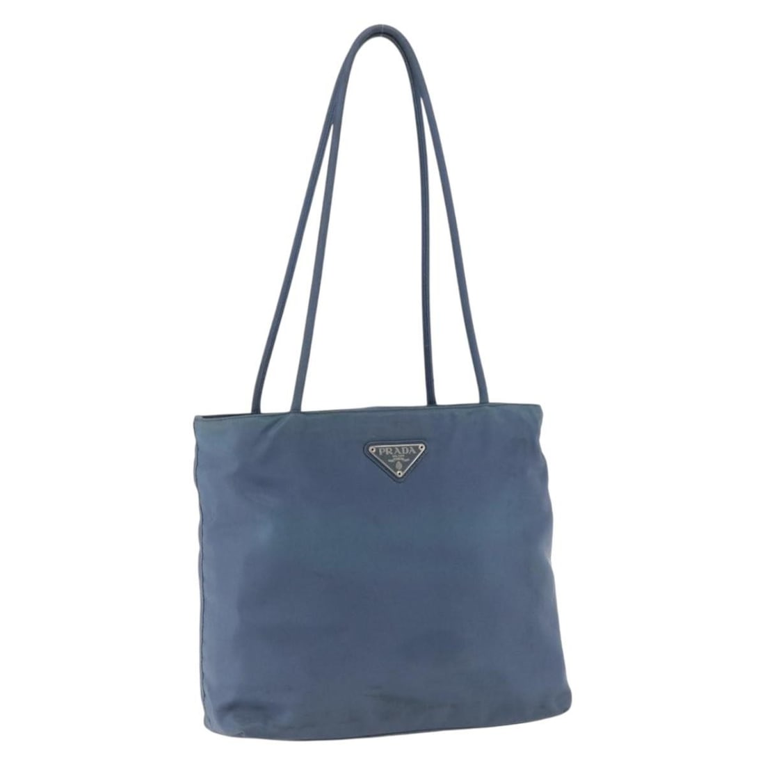 Blue Silver Nylon Tote Bag by Prada BA10133 Made in Italy: Blue Silver Nylon Tote Bag by Prada BA10133 Made in Italy This Prada tote bag features a nylon exterior in blue and silver tones. It includes a handle with a drop length suitable for comfortable carry