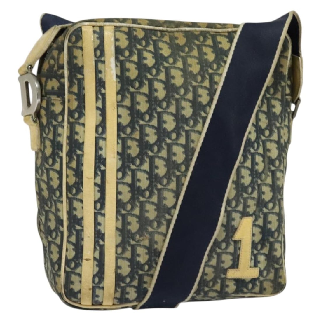Christian Dior Navy Silver Trotter Canvas Shoulder Bag Auth MU0121: Christian Dior Navy Silver Trotter Canvas Shoulder Bag Auth MU0121 This Christian Dior Trotter Canvas Shoulder Bag features a sophisticated navy and silver color scheme, crafted from durable Trotter c