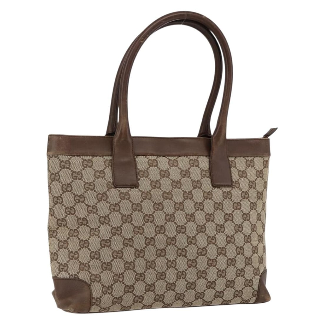 Beige GG Canvas 002 1119 Tote Handbag by Gucci: Beige GG Canvas 002 1119 Tote Handbag by Gucci This Gucci GG Canvas tote bag features a beige exterior crafted from signature GG canvas. Made in Italy, the bag is designed with a spacious interior and