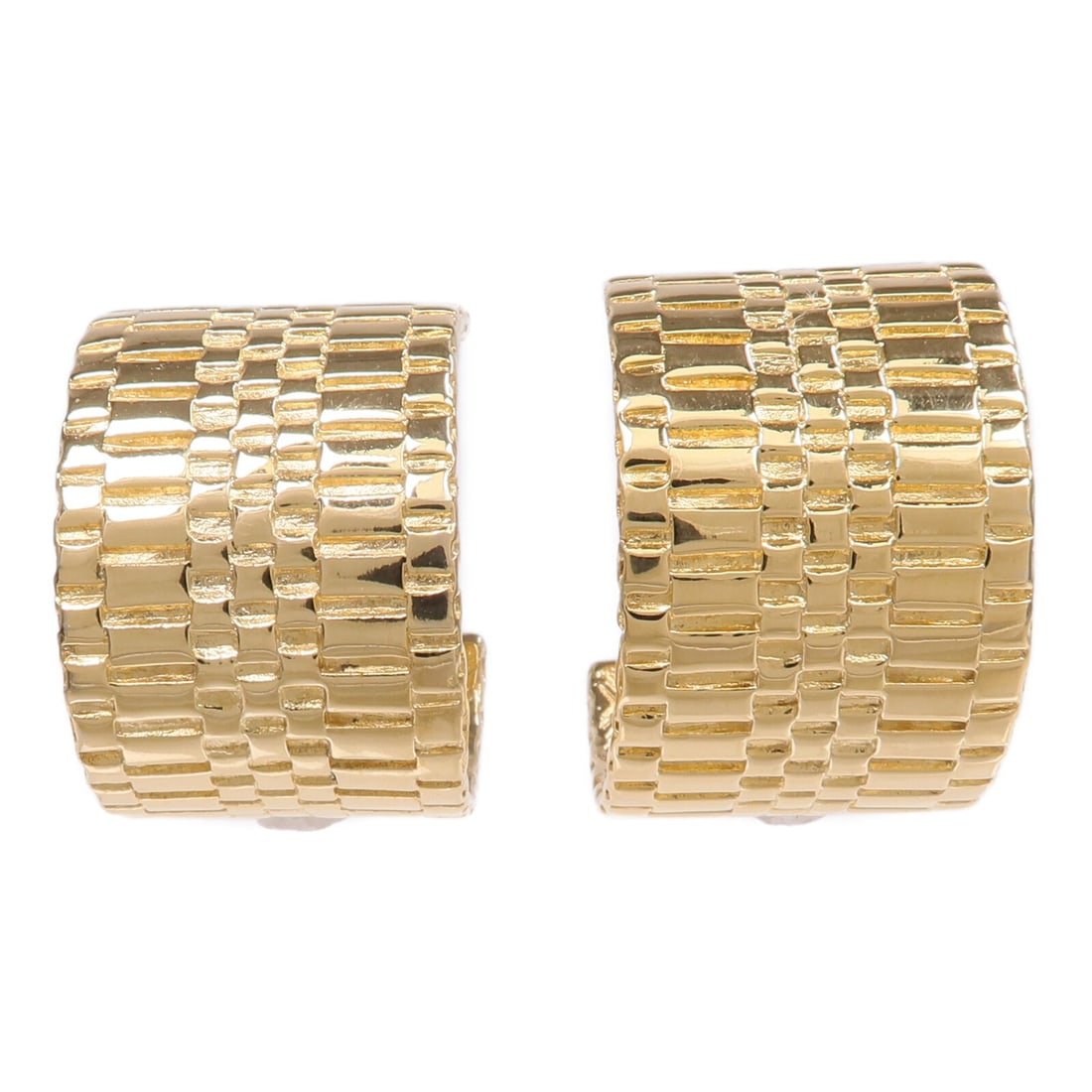 Gold Tone Metal Earrings by Givenchy: Gold Tone Metal Earrings by Givenchy These Givenchy earrings feature a gold color with a metal construction. Designed without any stones, they offer a classic and versatile look. The earrings are in v