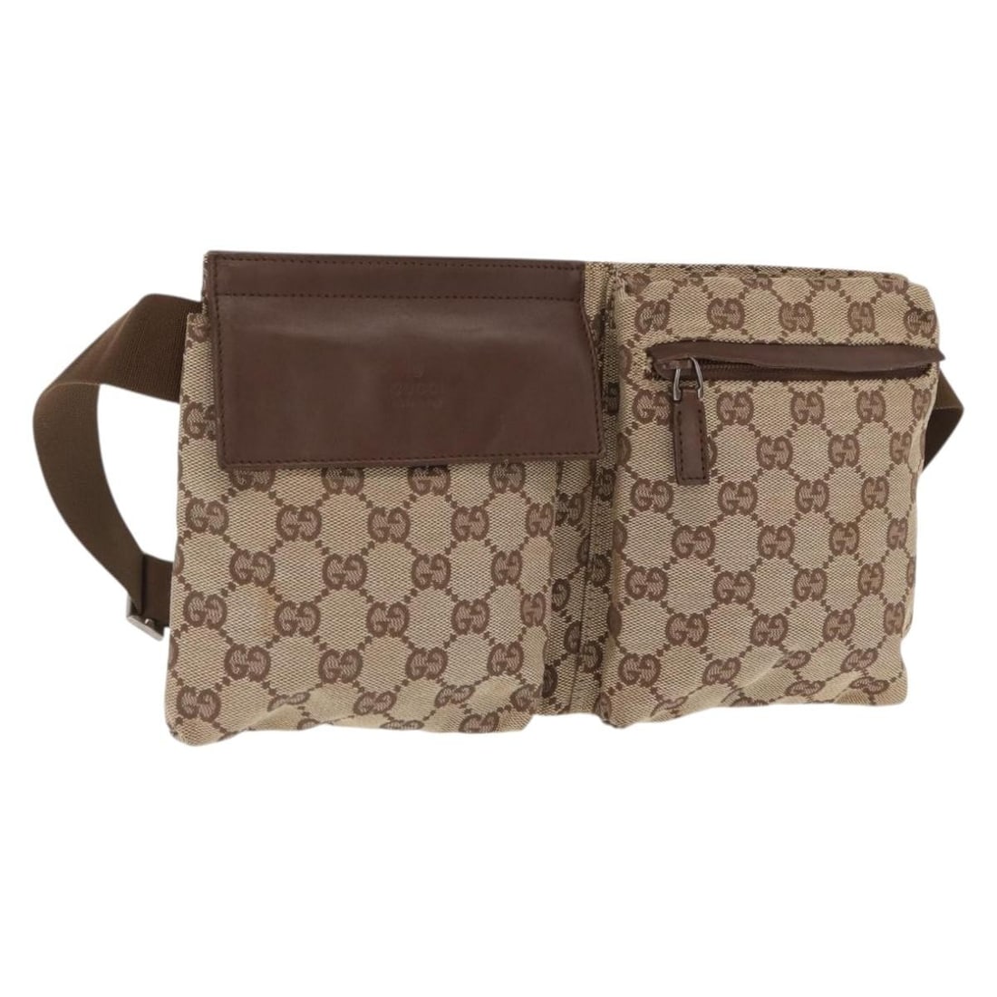 Beige Silver GG Canvas Waist Bag by Gucci Model 28566: Beige Silver GG Canvas Waist Bag by Gucci Model 28566 This Gucci GG Canvas waist bag features a beige and silver color scheme and is crafted from signature GG canvas material. The bag offers a practic