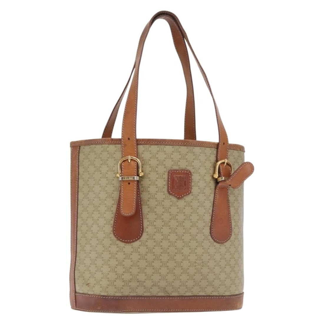 Celine Macadam Beige and Gold PVC Canvas Tote Bag from Italy: Celine Macadam Beige and Gold PVC Canvas Tote Bag from Italy This CELINE Macadam Canvas tote bag features a beige and gold exterior crafted from PVC leather and Macadam canvas. The bag is made in Ital
