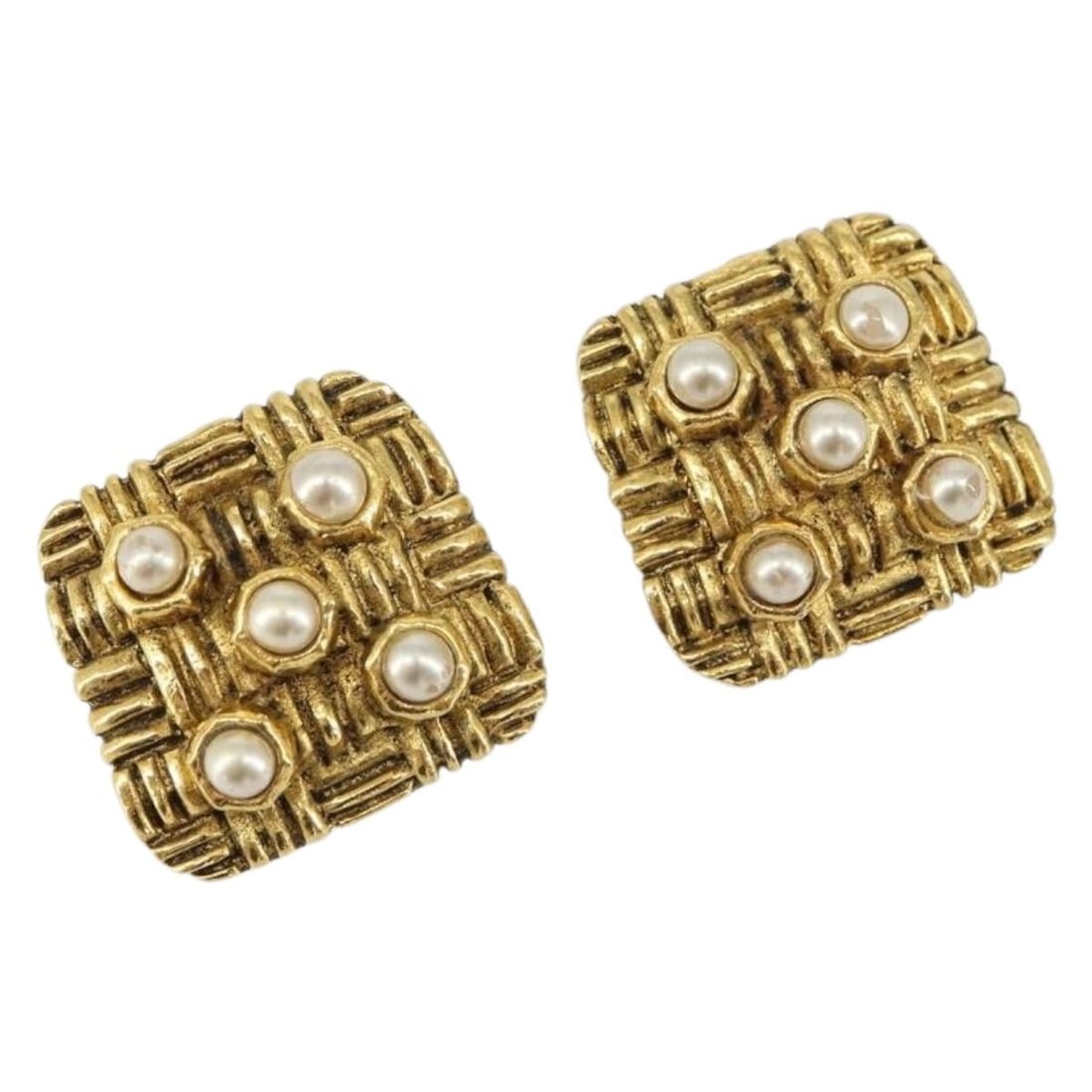 Gold Metal CC Logo Earring by CHANEL France: Gold Metal CC Logo Earring by CHANEL France This authentic CHANEL earring features the iconic CC design in gold-tone metal. Crafted in France, it showcases a classic and elegant style. The earring is