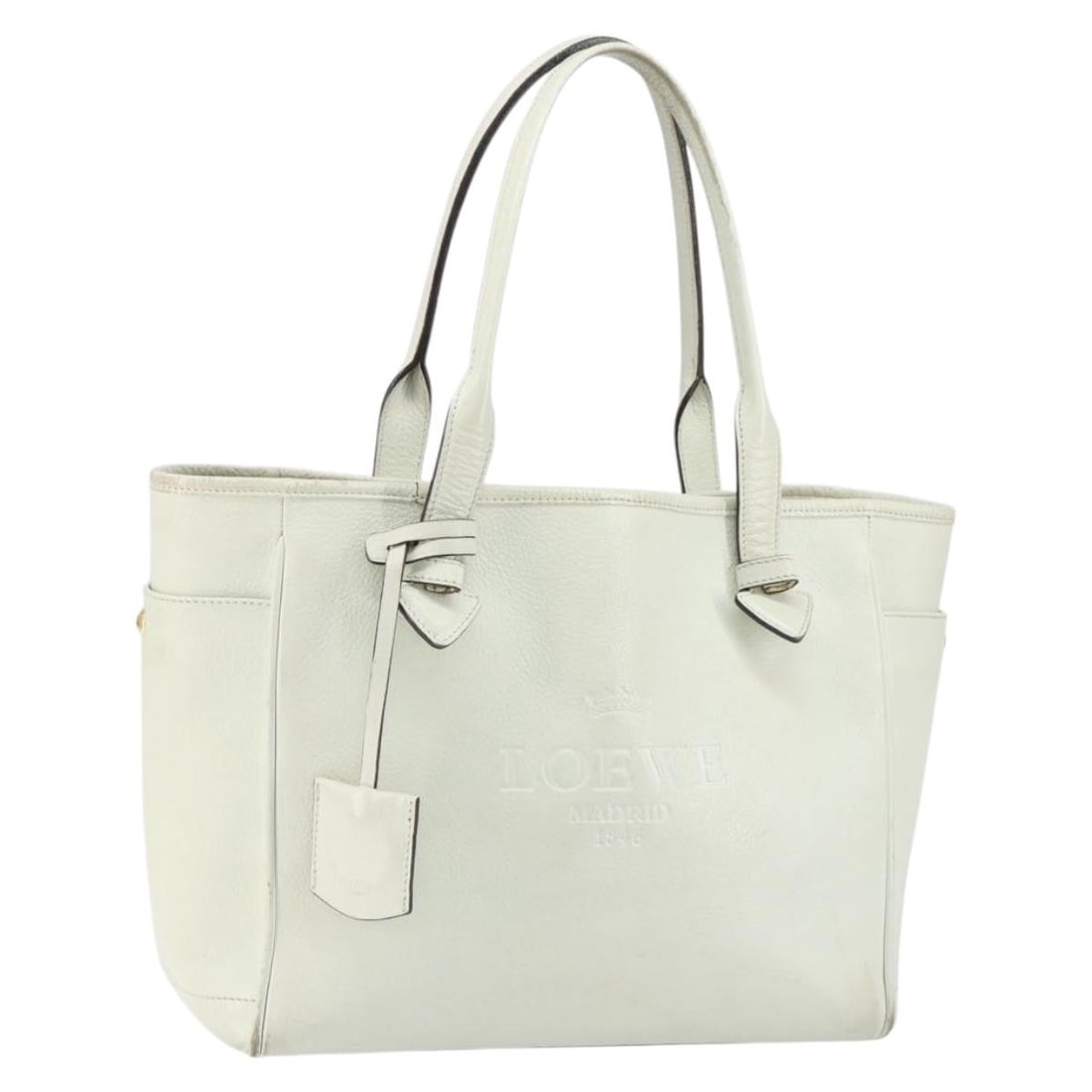 LOEWE Heritage Tote Bag Leather White Gold Made in Spain: LOEWE Heritage Tote Bag Leather White Gold Made in Spain This LOEWE Heritage Tote Bag embodies a sophisticated blend of style and functionality. Crafted from high-quality leather, this tote features a