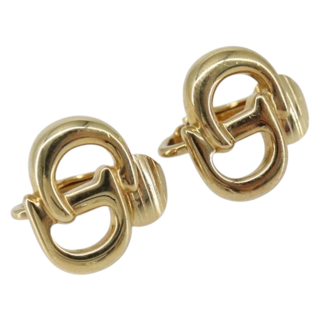 Gold Metal Earring by Christian Dior: Gold Metal Earring by Christian Dior These Christian Dior earrings feature a gold-tone metal construction with a classic design. They show slight rubbing on the surface consistent with reasonable wear