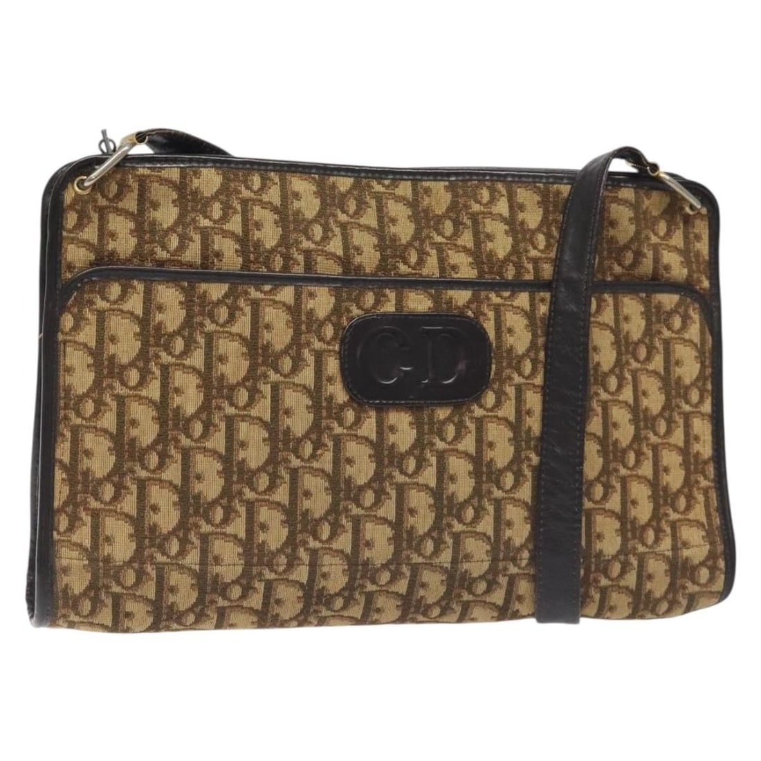 Christian Dior Brown Trotter Canvas Shoulder Bag France Auth 131559: Christian Dior Brown Trotter Canvas Shoulder Bag France Auth 131559 This Christian Dior Trotter Canvas Shoulder Bag is a stylish accessory that combines practicality with luxury. Crafted from durable