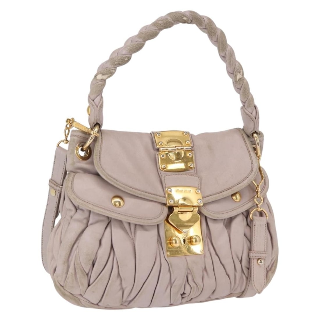 Miu Miu Pink Gold Matelasse Leather Shoulder Bag with Key: Miu Miu Pink Gold Matelasse Leather Shoulder Bag with Key This Miu Miu Matelasse shoulder bag is crafted from leather in a pink and gold color combination. It features a structured silhouette with bot