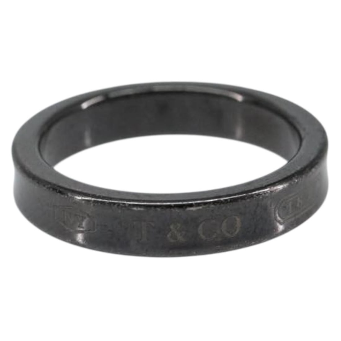 TIFFANY&Co. 1837 Narrow Black Titanium Ring Auth am9716: TIFFANY&Co. 1837 Narrow Black Titanium Ring Auth am9716 Presenting a Tiffany & Co. 1837 Narrow Titanium Ring, crafted from durable metal with a sleek black finish. This stylish ring is designed for th