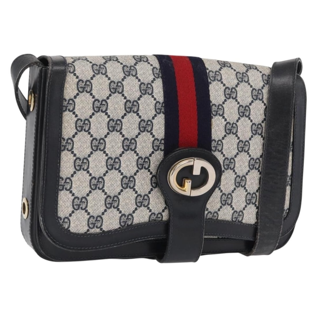 Navy GG Supreme Sherry Line Shoulder Bag by Gucci in PVC Leather: Navy GG Supreme Sherry Line Shoulder Bag by Gucci in PVC Leather This is a Gucci GG Supreme Sherry Line shoulder bag crafted from PVC leather with GG canvas accents in navy and gold tones. The bag fea