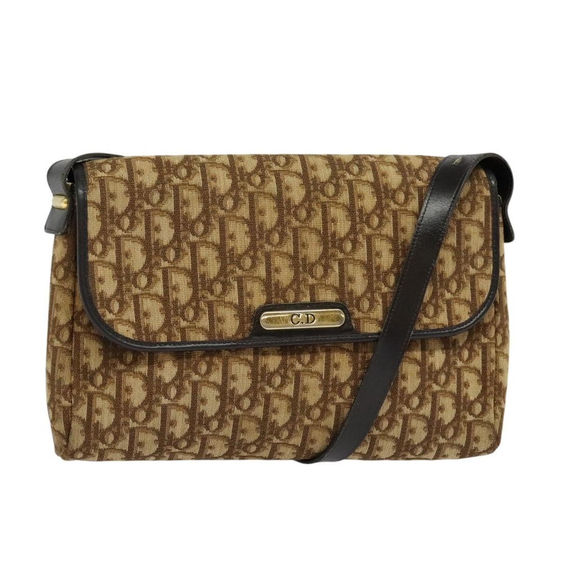 Christian Dior Brown Gold Trotter Canvas Shoulder Bag Auth: Christian Dior Brown Gold Trotter Canvas Shoulder Bag Auth This authentic Christian Dior Trotter Canvas Shoulder Bag showcases a stylish blend of brown and gold, crafted from durable Trotter Canvas. W