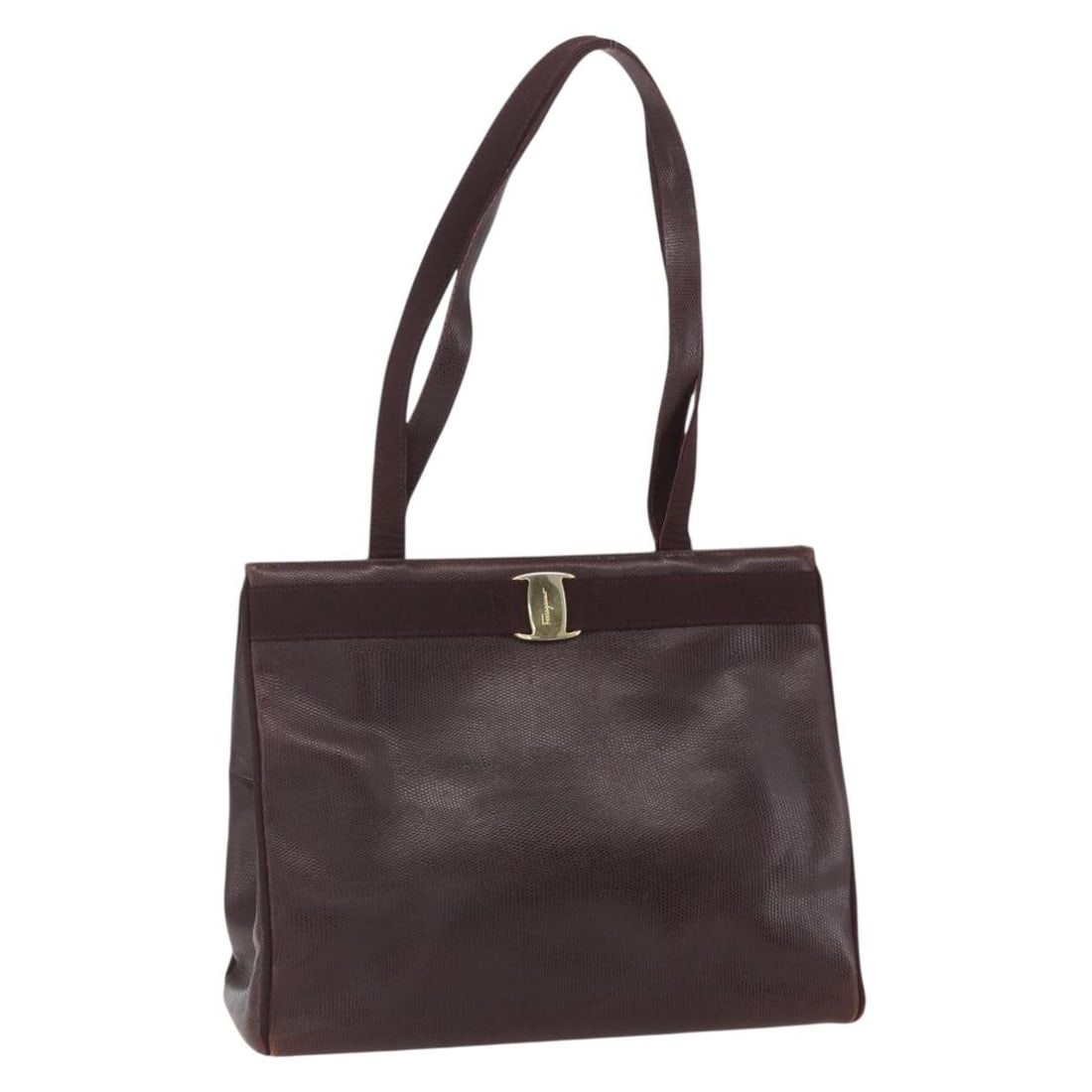 Ferragamo Brown Leather Tote with Gold Tone Accents Italy: Ferragamo Brown Leather Tote with Gold Tone Accents Italy This Salvatore Ferragamo tote bag is crafted from brown leather with gold-tone accents. Made in Italy, it features a spacious interior and dua