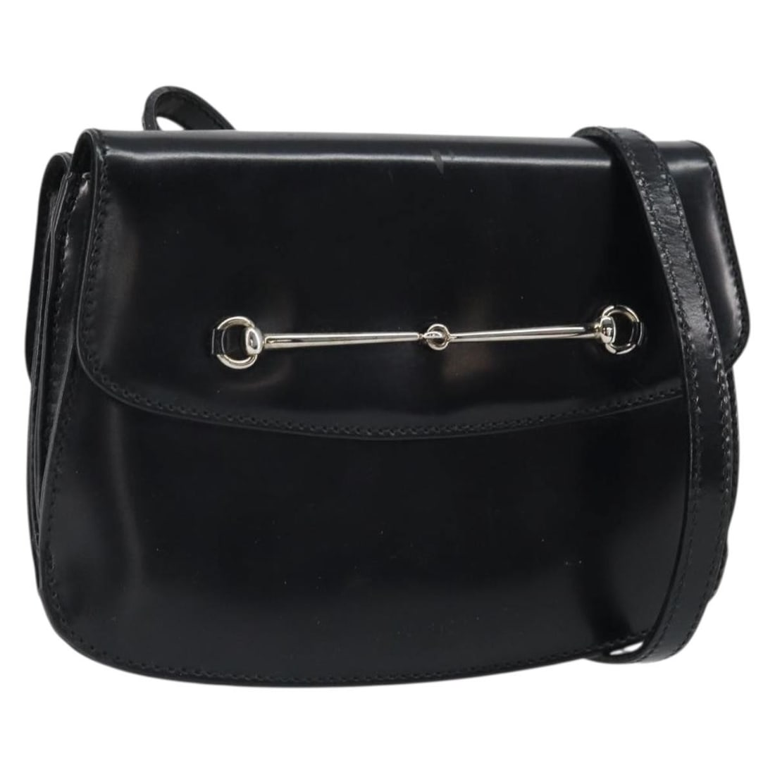 Black Patent Leather Gucci Shoulder Bag Silver Accents: Black Patent Leather Gucci Shoulder Bag Silver Accents This GUCCI shoulder bag is crafted from black patent leather with silver accents. Made in Italy, it features a compact design and a long shoulder