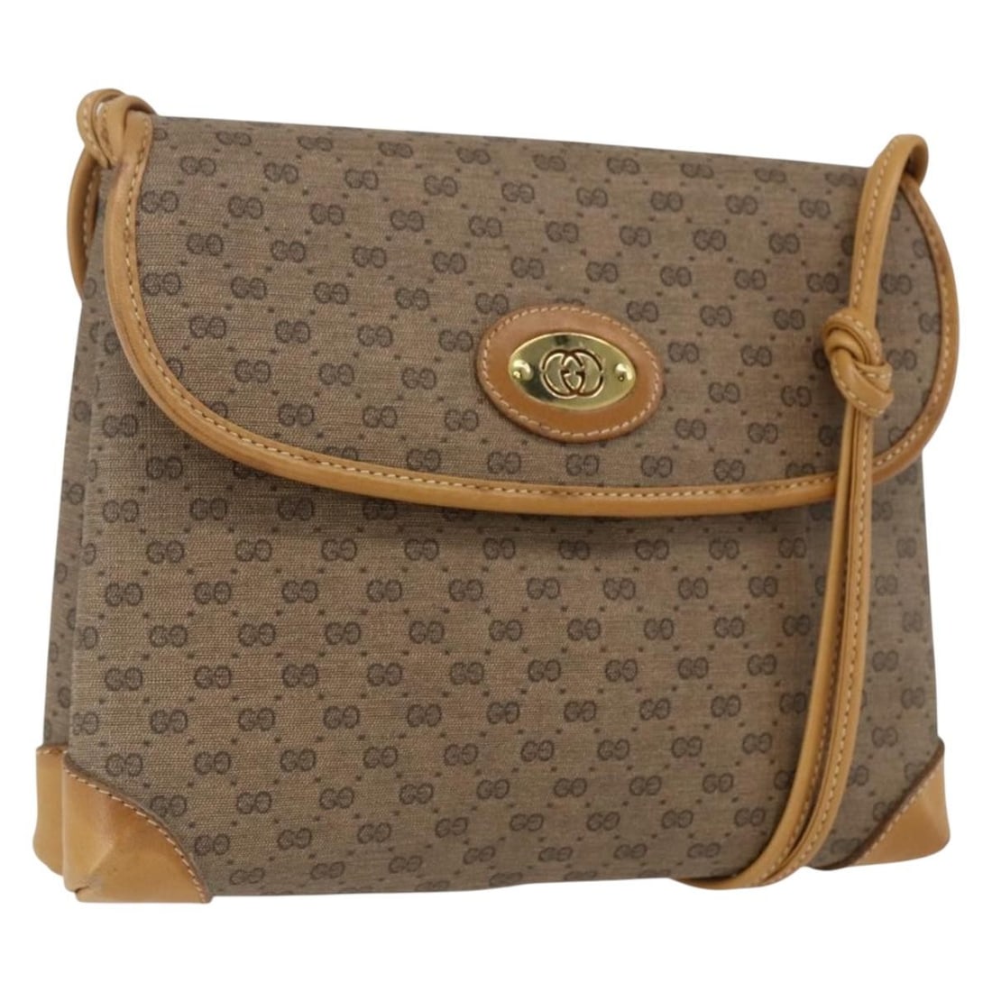 Beige Gold GUCCI Micro GG Supreme PVC Shoulder Bag 49 007 5548: Beige Gold GUCCI Micro GG Supreme PVC Shoulder Bag 49 007 5548 This GUCCI Micro GG Supreme Shoulder Bag features beige and gold PVC leather with micro small GG canvas. The bag has a structured silhoue