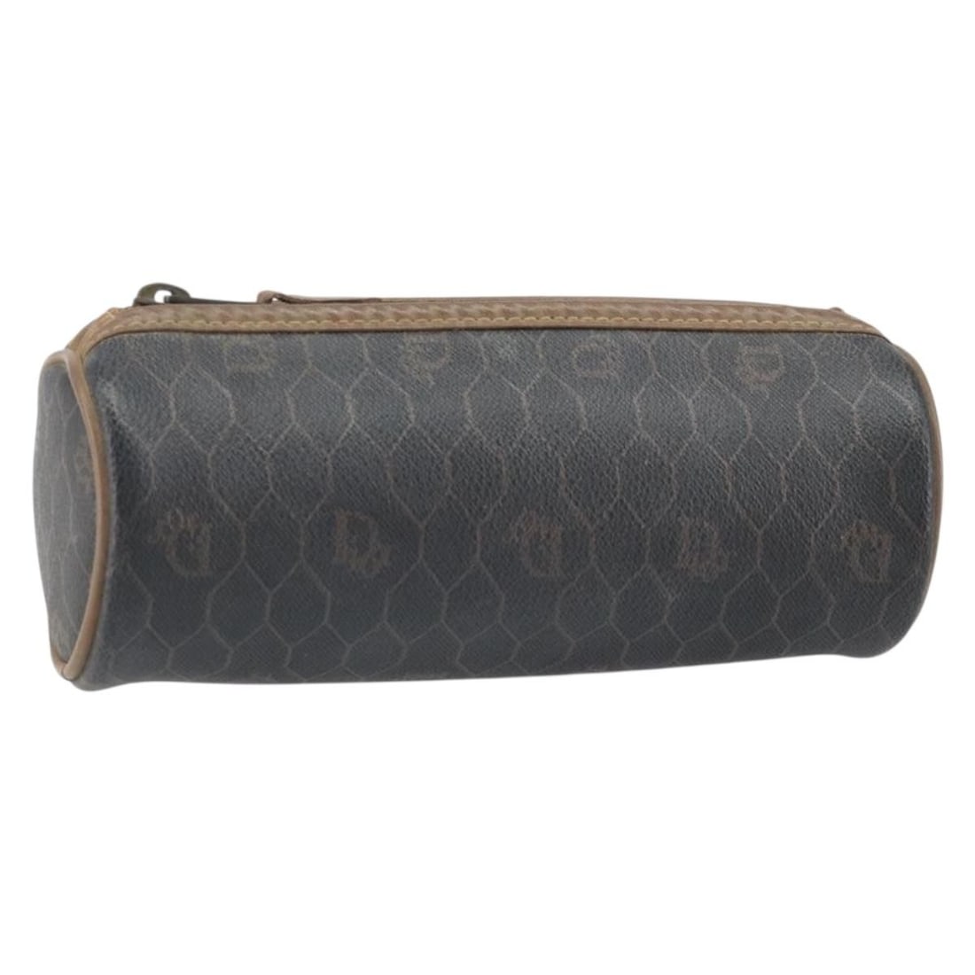 Black Honeycomb PVC Leather Pouch by Christian Dior: Black Honeycomb PVC Leather Pouch by Christian Dior This Christian Dior pouch features a distinctive honeycomb canvas design with PVC leather trim in black. Made in France, this compact accessory is d