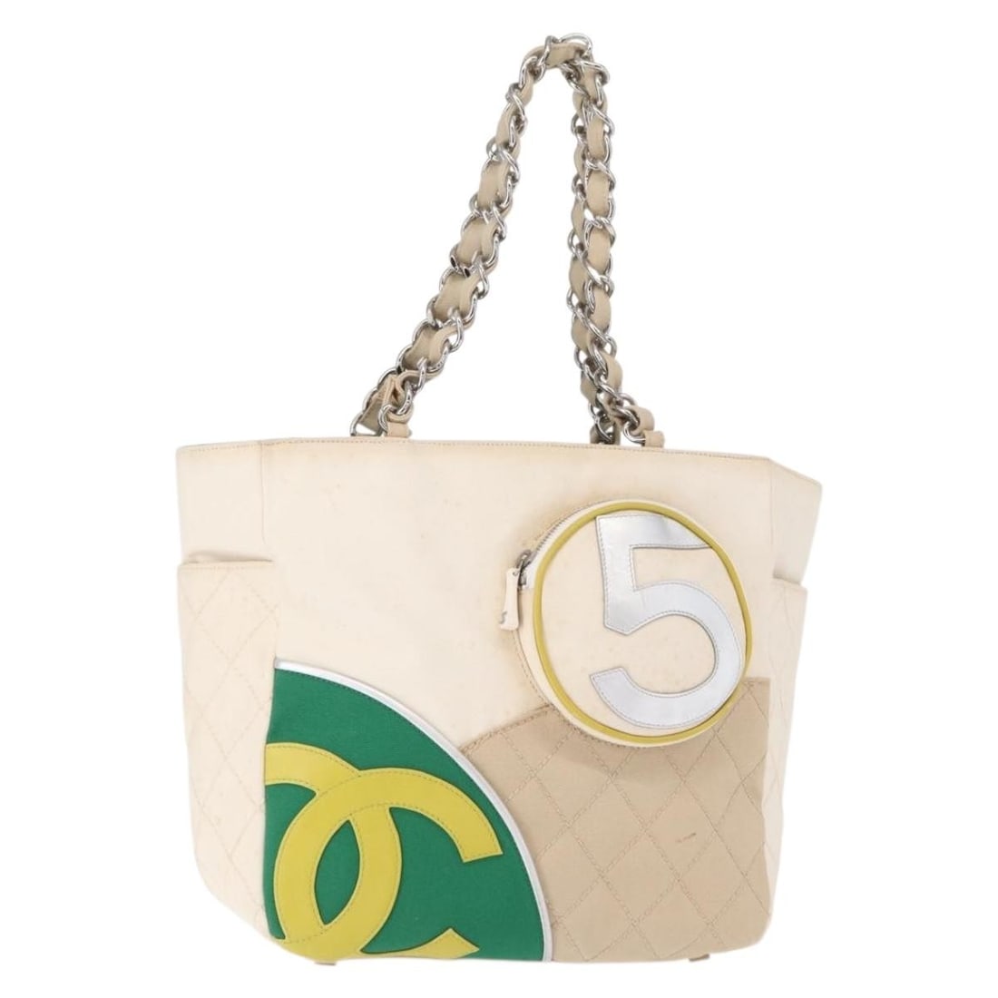 CHANEL No5 Beige Canvas Tote Bag with Silver CC Auth 155949: CHANEL No5 Beige Canvas Tote Bag with Silver CC Auth 155949 This authentic CHANEL No5 Chain Tote Bag is a stylish accessory crafted from durable canvas in a chic beige and silver color scheme. Designe