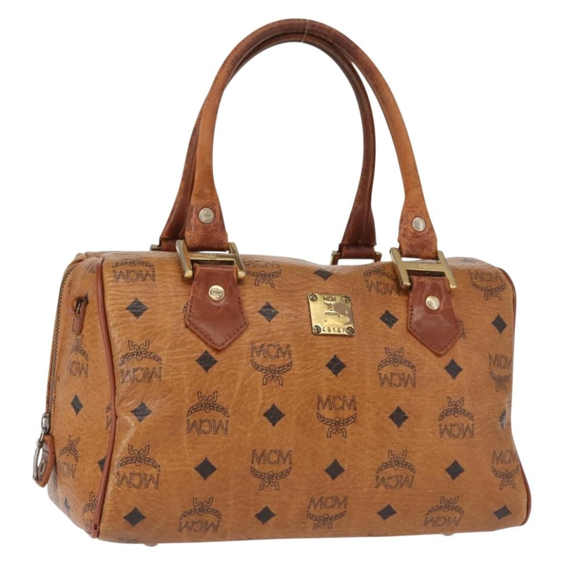 MCM Logogram Vicetos Hand Bag PVC Leather Brown Gold Auth BA8791: MCM Logogram Vicetos Hand Bag PVC Leather Brown Gold Auth BA8791 This MCM Logogram Vicetos Hand Bag is a stylish accessory crafted from durable PVC leather in a chic brown and gold color scheme. Made