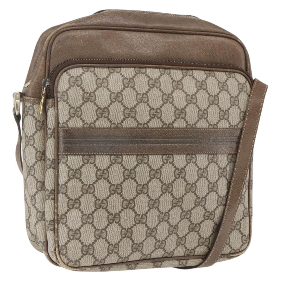 Beige Gold PVC GG Supreme Shoulder Bag by Gucci 49 003 5101: Beige Gold PVC GG Supreme Shoulder Bag by Gucci 49 003 5101 This Gucci GG Supreme shoulder bag features a beige and gold PVC leather exterior with GG canvas accents. The bag is designed with a shoulde