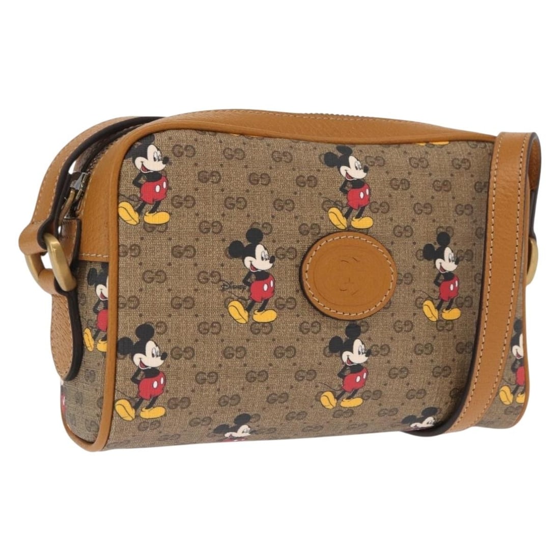 Disney Micro GG Supreme Shoulder Bag by Gucci in Beige PVC Leather: Disney Micro GG Supreme Shoulder Bag by Gucci in Beige PVC Leather This Gucci Micro GG Supreme Disney shoulder bag features a beige and gold PVC leather exterior with micro GG canvas accents. Designed