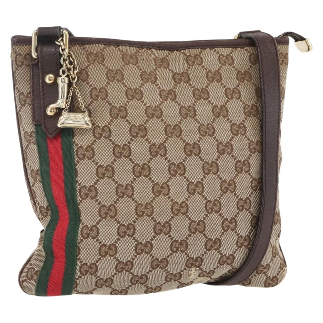 Gucci Sherry Line GG Canvas Beige Gold Shoulder Bag with Charm 144388: Gucci Sherry Line GG Canvas Beige Gold Shoulder Bag with Charm 144388 This is a Gucci GG Canvas Web Sherry Line shoulder bag in beige and gold. Crafted from GG canvas, the bag features a shoulder stra