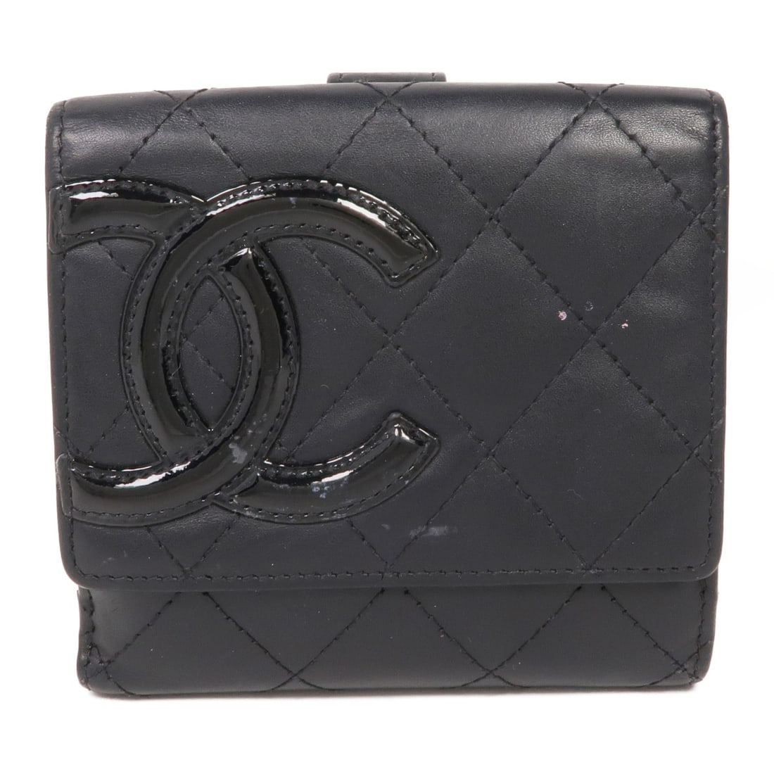 Black Calfskin Cambon Bi-Fold Wallet by CHANEL with Silver CC Logo: Black Calfskin Cambon Bi-Fold Wallet by CHANEL with Silver CC Logo This is a CHANEL Cambon bi-fold wallet crafted from black calfskin leather. The wallet features a classic CC logo with silver-tone ha