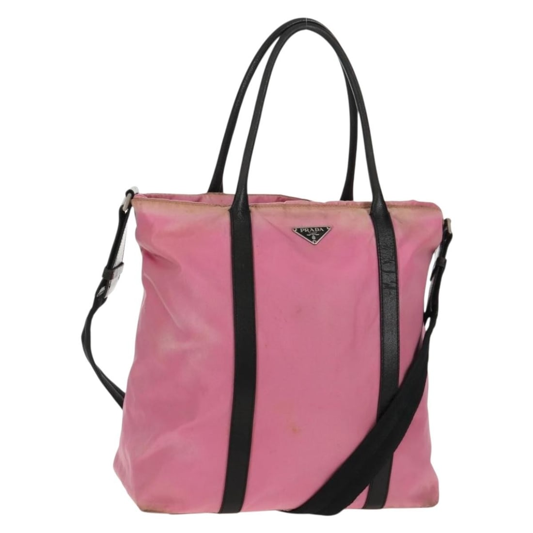 Prada Pink and Black Nylon Convertible Handbag with Leather Accents: Prada Pink and Black Nylon Convertible Handbag with Leather Accents This PRADA 2-way handbag features a pink and black nylon exterior with leather accents, offering both versatility and style. Made in