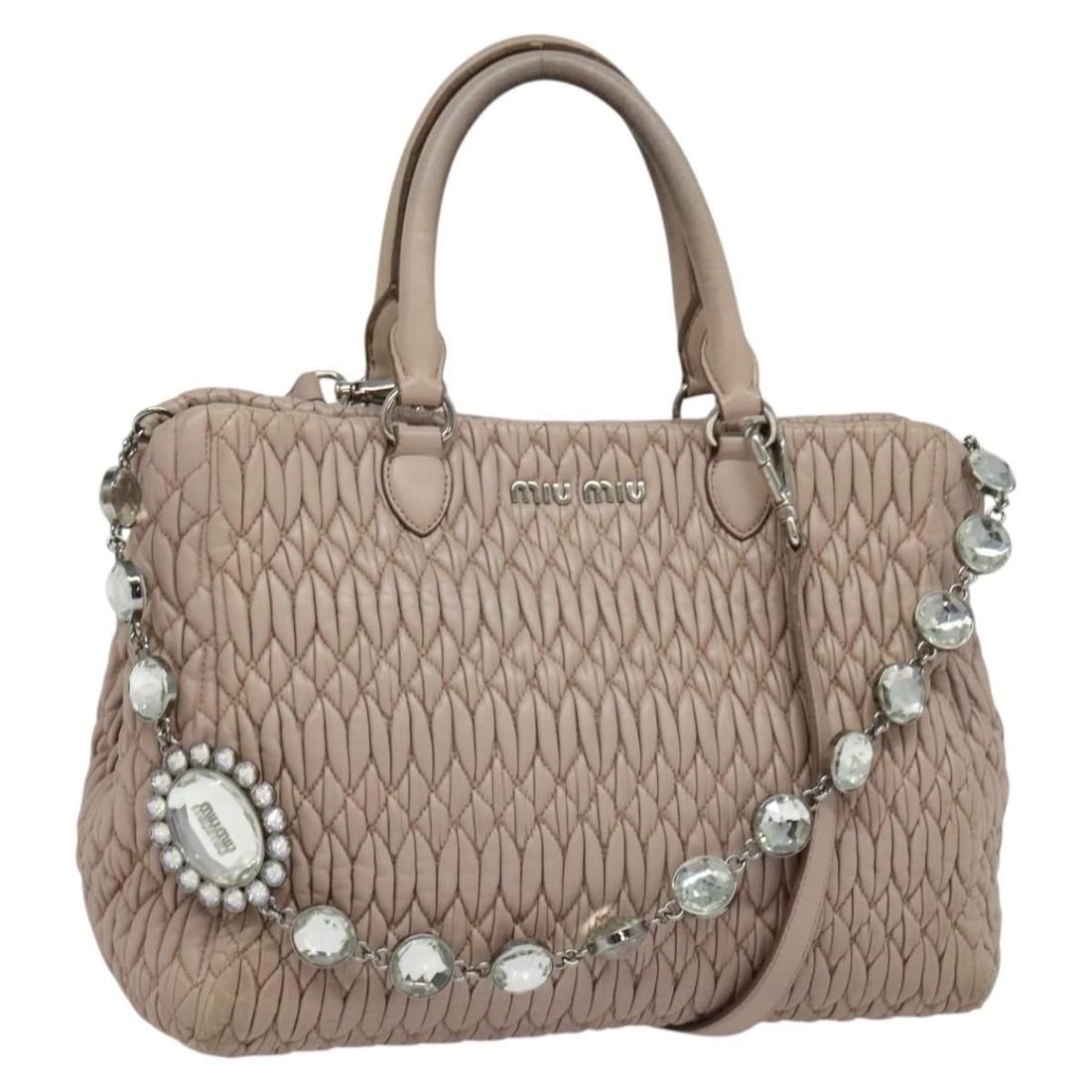 Miu Miu Pink Silver Leather Matelasse Hand Bag Auth gh653: Miu Miu Pink Silver Leather Matelasse Hand Bag Auth gh653 This Miu Miu Matelasse Hand Bag is a stylish accessory crafted from high-quality leather, featuring a chic pink and silver color scheme. The b