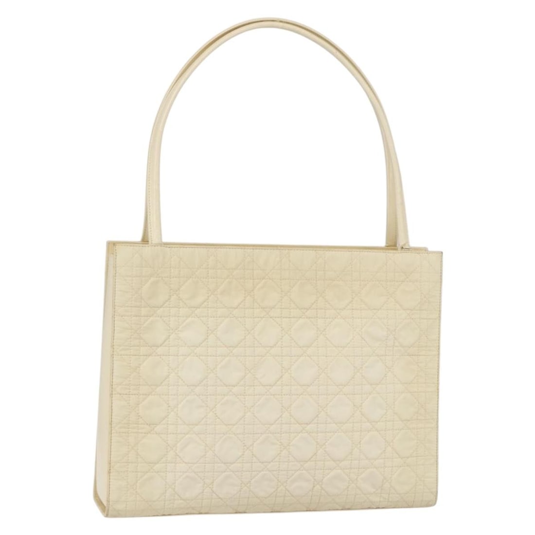 Christian Dior Beige Nylon Canage Tote Bag with Guarantee Card: Christian Dior Beige Nylon Canage Tote Bag with Guarantee Card This Christian Dior Canage Tote Bag is a stylish accessory crafted in Italy from durable nylon in a sophisticated beige hue. The bag feat
