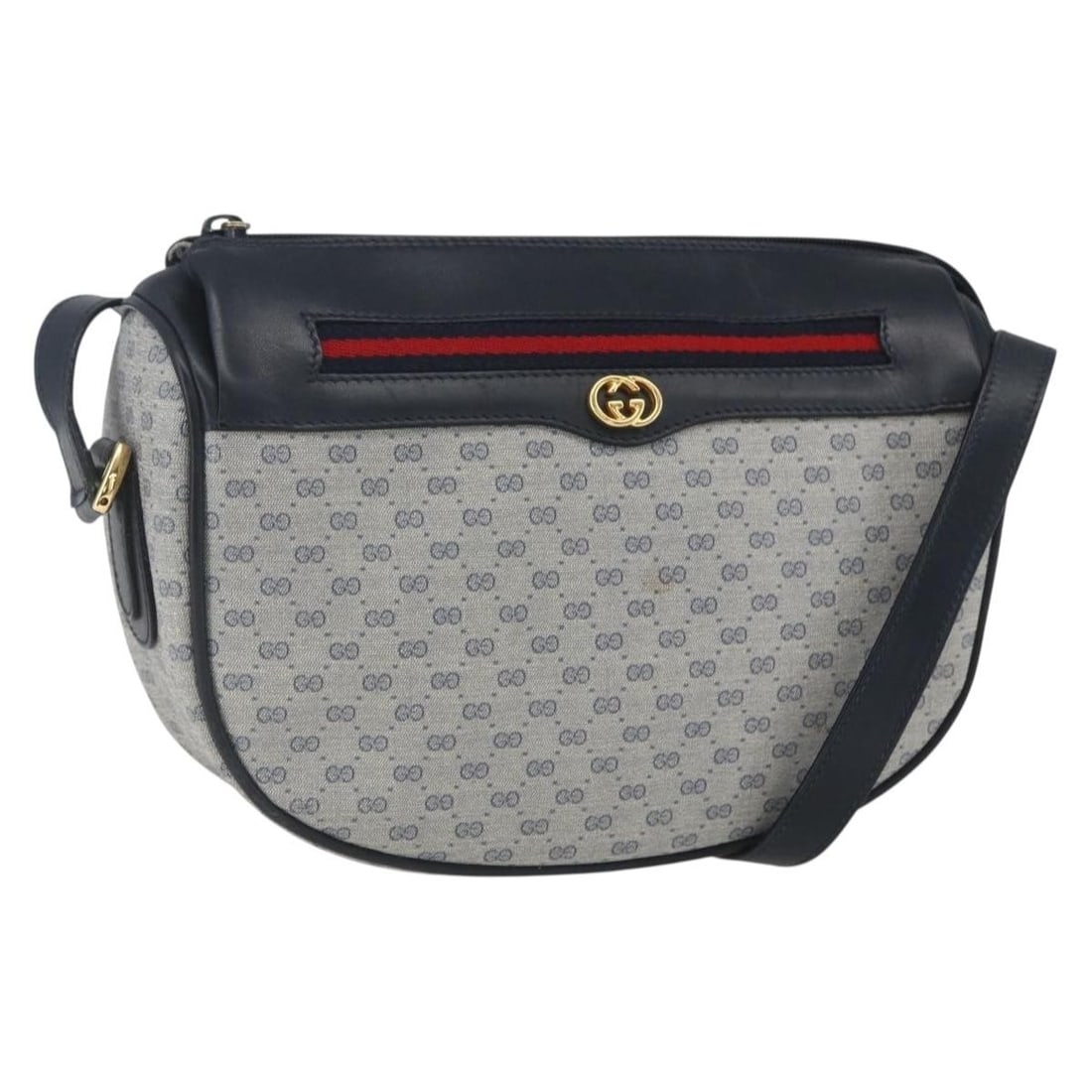 GUCCI 001 58 0918 Navy Gold Micro GG Supreme PVC Shoulder Bag: GUCCI 001 58 0918 Navy Gold Micro GG Supreme PVC Shoulder Bag This GUCCI Micro GG Supreme Sherry Line shoulder bag features navy and gold colors crafted from PVC leather and Micro Small GG canvas. The