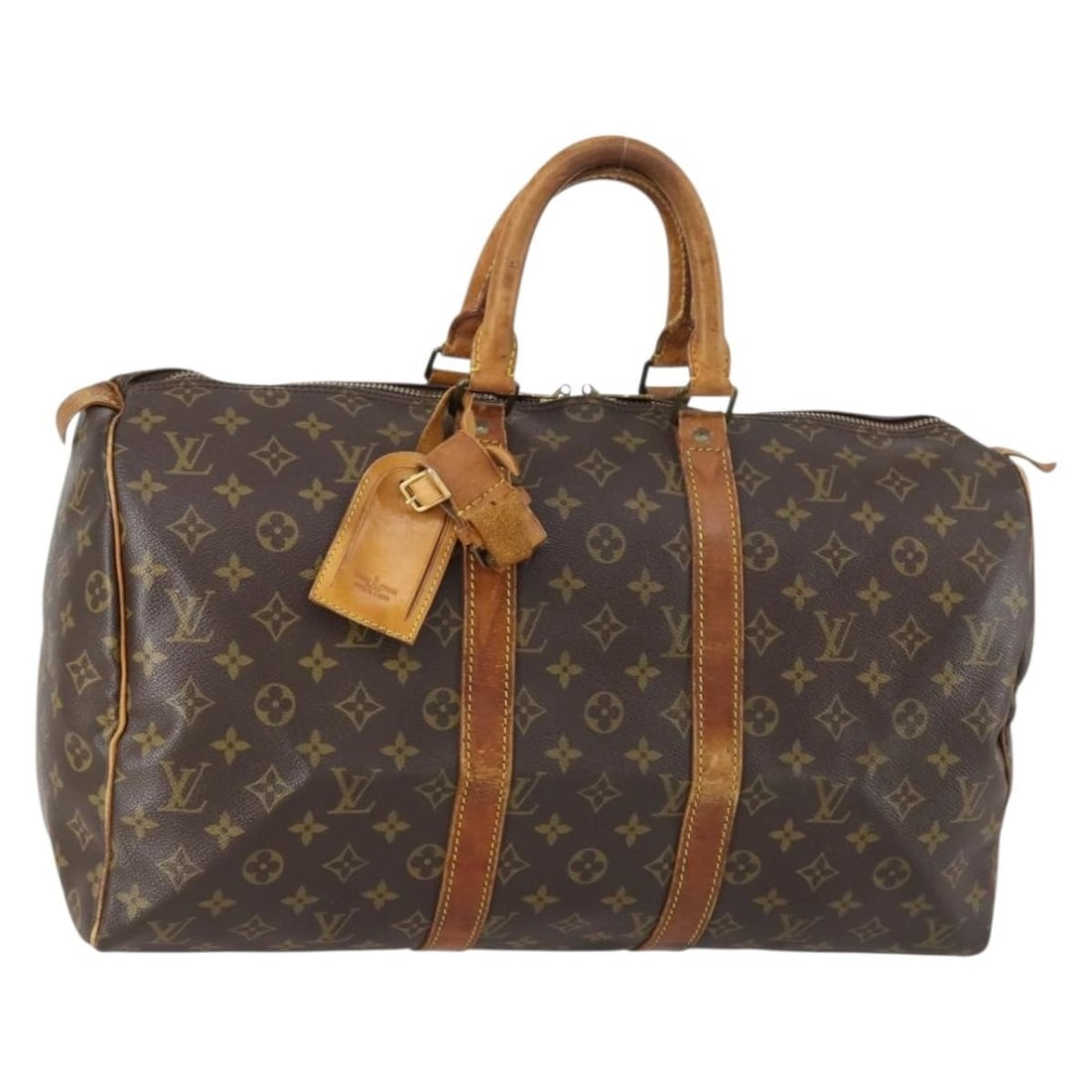 LOUIS VUITTON Monogram Keepall 45 Boston Bag M41428 Authentic: LOUIS VUITTON Monogram Keepall 45 Boston Bag M41428 Authentic This LOUIS VUITTON Monogram Keepall 45 Boston Bag (M41428) is a luxurious travel companion, crafted from iconic Monogram Canvas. Made in F