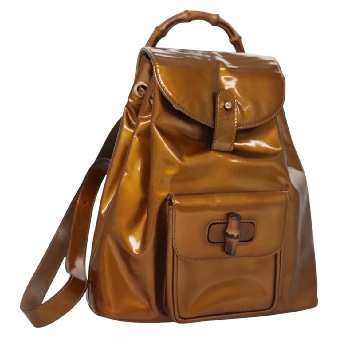 GUCCI Bamboo Backpack Patent Leather Bronze Gold 003 1705 0030 Auth: GUCCI Bamboo Backpack Patent Leather Bronze Gold 003 1705 0030 Auth This GUCCI Bamboo Backpack showcases a stunning patent leather exterior in a unique bronze and gold hue. Measuring approximately 7.9