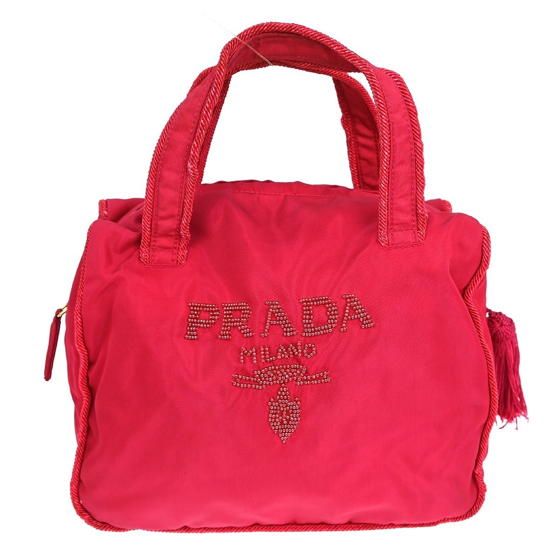 Small Pink Nylon Prada Handbag with Logo Accent: Small Pink Nylon Prada Handbag with Logo Accent This Prada handbag features a compact, small size and is crafted from pink nylon with matching pink nylon handles. The bag is accented with a Prada logo