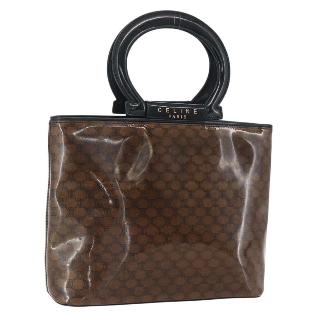 Brown Gold Vinyl Celine Macadam Canvas Handbag Made in Italy: Brown Gold Vinyl Celine Macadam Canvas Handbag Made in Italy This CELINE handbag features a brown and gold vinyl exterior with a macadam canvas design. Made in Italy, it measures approximately 9.4 inc