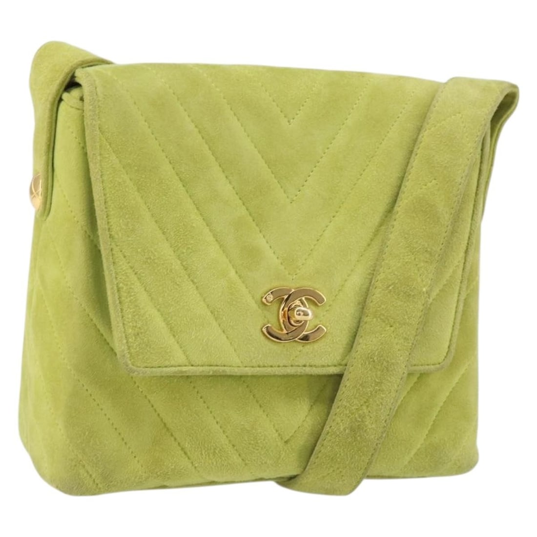 Green Suede CHANEL V Stitch Shoulder Bag with Gold Tone CC Italy: Green Suede CHANEL V Stitch Shoulder Bag with Gold Tone CC Italy This CHANEL V Stitch shoulder bag features a stylish green and gold suede exterior with signature gold-tone CC detailing. Made in Italy