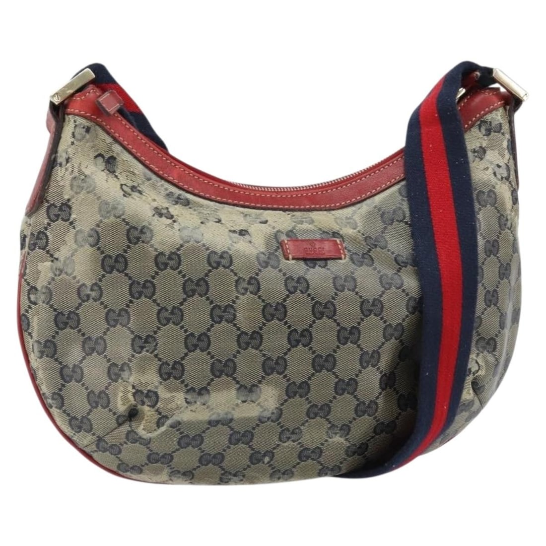 Gucci GG Crystal Navy Gold Shoulder Bag Coated Canvas Model 181092: Gucci GG Crystal Navy Gold Shoulder Bag Coated Canvas Model 181092 This authentic Gucci GG Crystal shoulder bag features a navy and gold coated canvas exterior with the signature GG pattern. The bag i