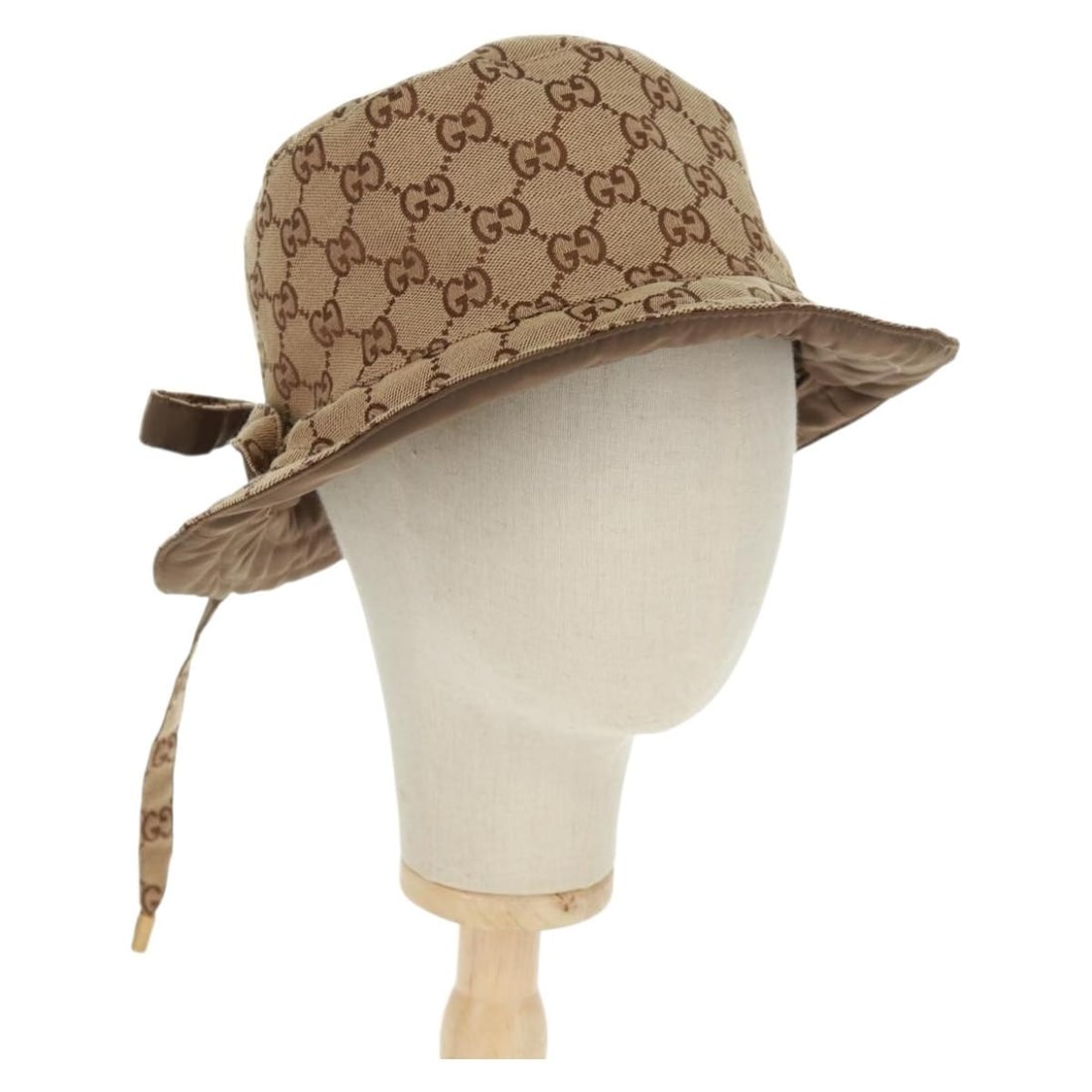 Beige GG Canvas Reversible Hat by Gucci with Dust Bag and Box: Beige GG Canvas Reversible Hat by Gucci with Dust Bag and Box This Gucci GG Canvas reversible bucket hat features the iconic GG canvas material in beige. Made in Italy, it is designed for versatile we