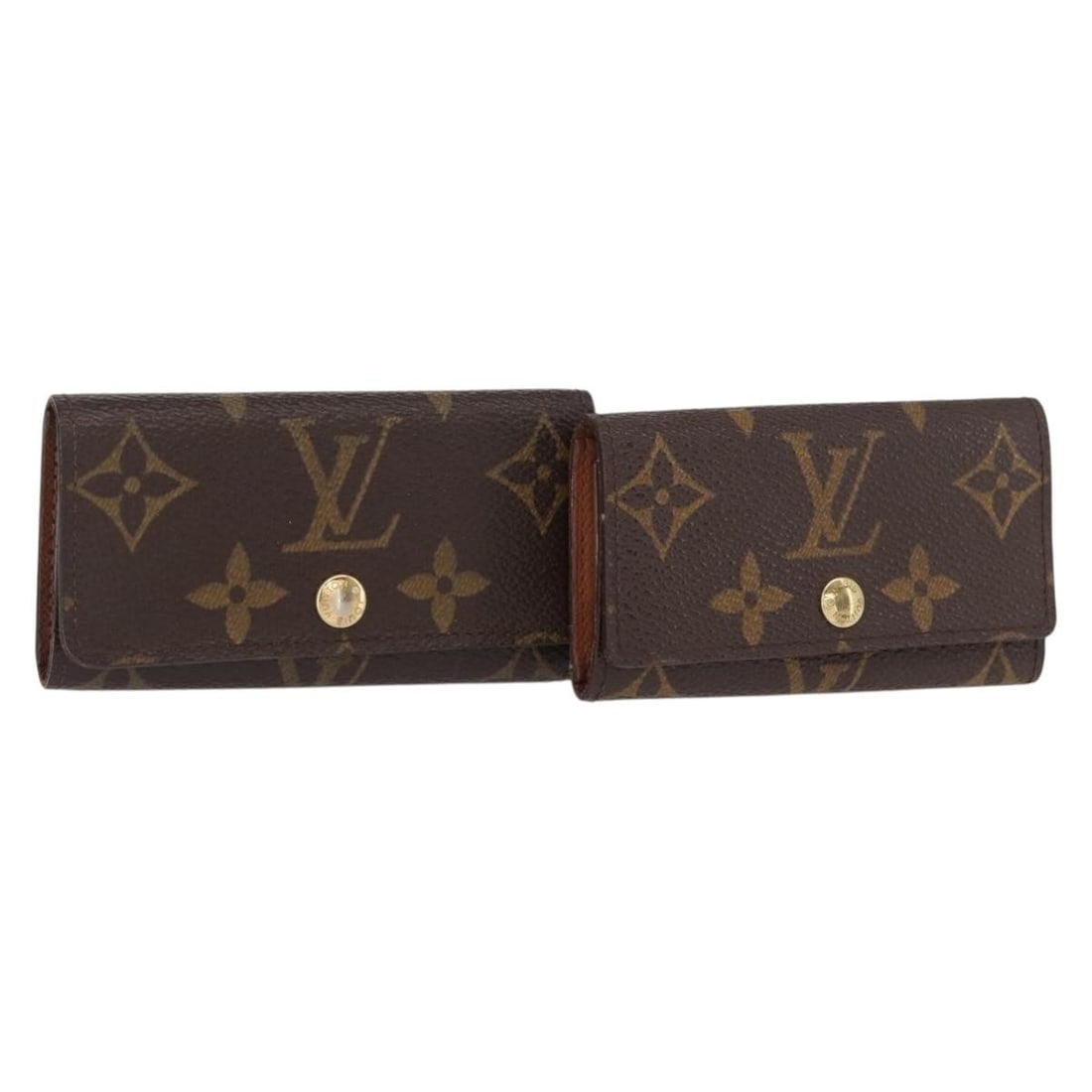 Set of 2 Monogram Canvas Multicles 4 Key Cases by Louis Vuitton: Set of 2 Monogram Canvas Multicles 4 Key Cases by Louis Vuitton This is a set of two Louis Vuitton Monogram Multicles 4 key cases crafted from the iconic monogram canvas. These key cases feature a cla