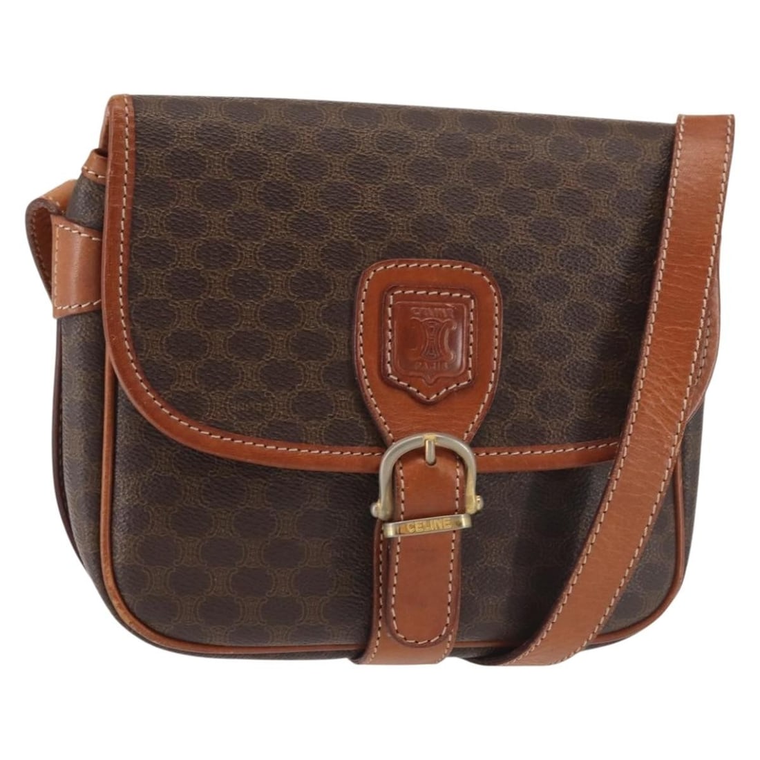 Celine Macadam Shoulder Bag in Brown PVC Leather and Canvas Gold Detail: Celine Macadam Shoulder Bag in Brown PVC Leather and Canvas Gold Detail This CELINE shoulder bag features the iconic Macadam canvas and is crafted from PVC leather in a brown and gold color scheme. De