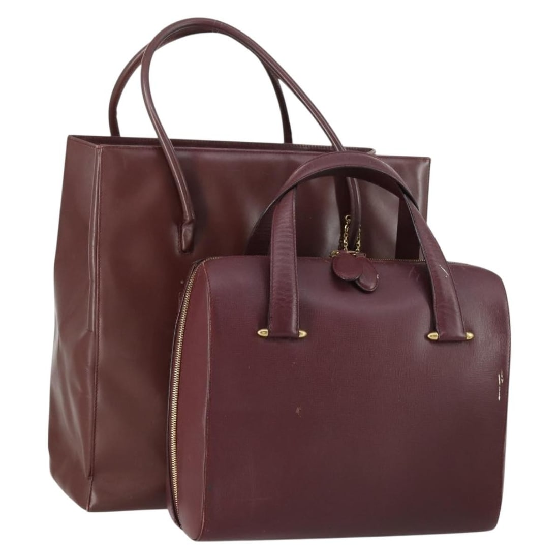 Set of 2 Cartier Bordeaux Leather Shoulder Bags with Guarantee Card: Set of 2 Cartier Bordeaux Leather Shoulder Bags with Guarantee Card This is a set of two Cartier shoulder bags crafted from Bordeaux leather. Both bags are heavily used and show significant signs of w