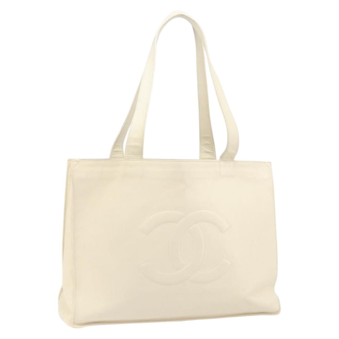 White CHANEL Caviar Skin Tote with CC Logo Made in France: White CHANEL Caviar Skin Tote with CC Logo Made in France This CHANEL tote bag is crafted from white caviar skin leather, known for its textured durability. Made in France, the bag features a spacious