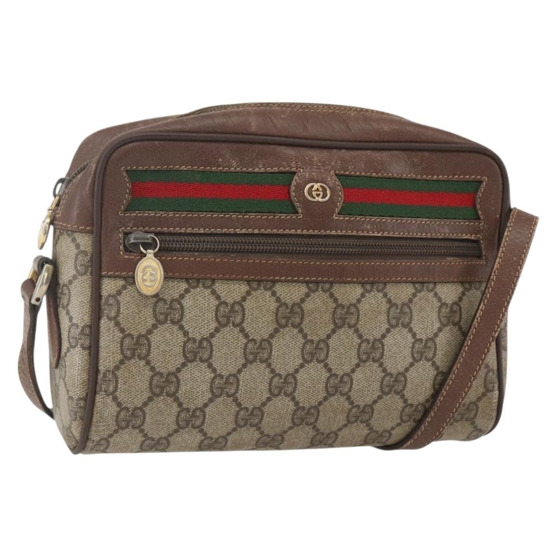 Beige GG Canvas Gucci Web Sherry Line Shoulder Bag 001 56 6655: Beige GG Canvas Gucci Web Sherry Line Shoulder Bag 001 56 6655 This is a Gucci GG Supreme Web Sherry Line shoulder bag crafted from beige and gold GG canvas. The bag features a classic shoulder strap