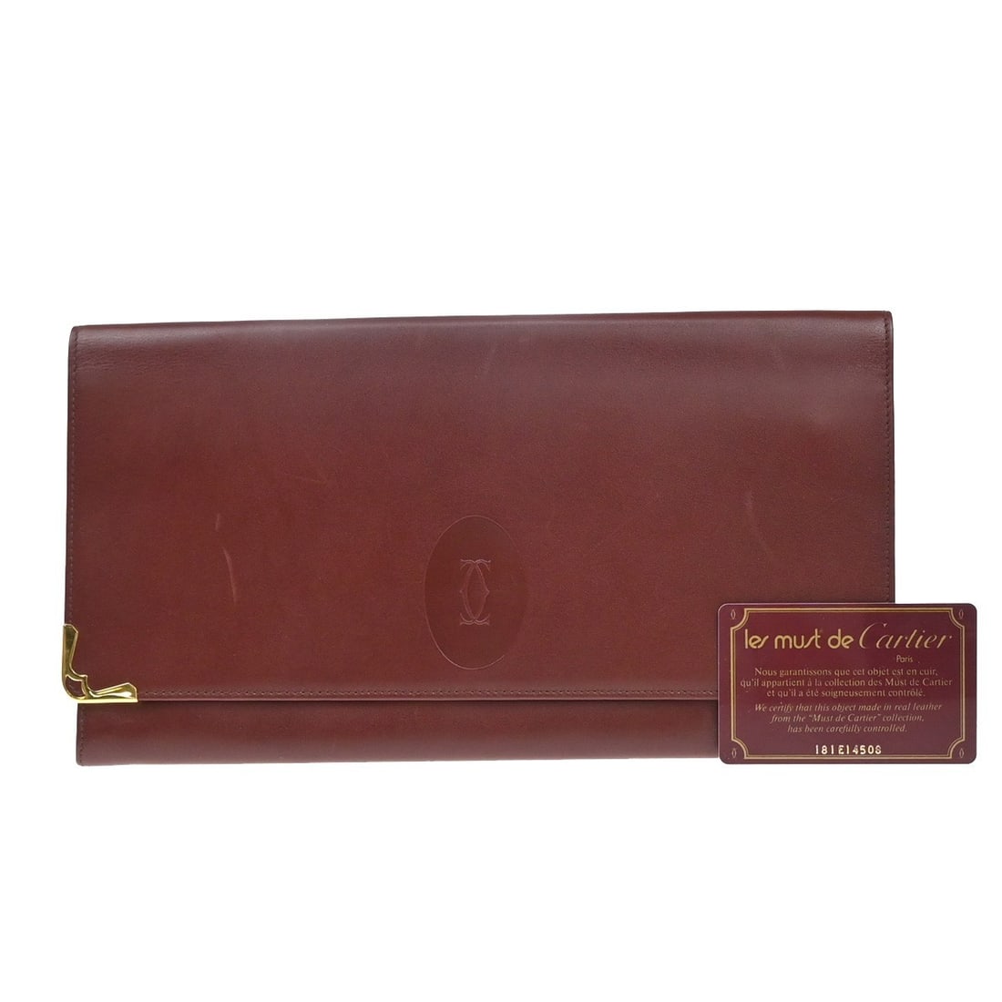 Must De Cartier burgundy leather women's bag 28cm Spain: Must De Cartier burgundy leather women's bag 28cm Spain This Must De Cartier leather item is crafted in burgundy leather and designed for women. Made in Spain, it features signs of use, including scuf
